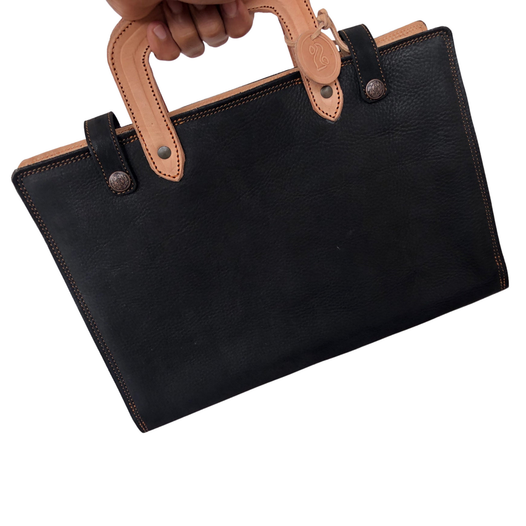 beautiful black and tan leather laptop sleeve