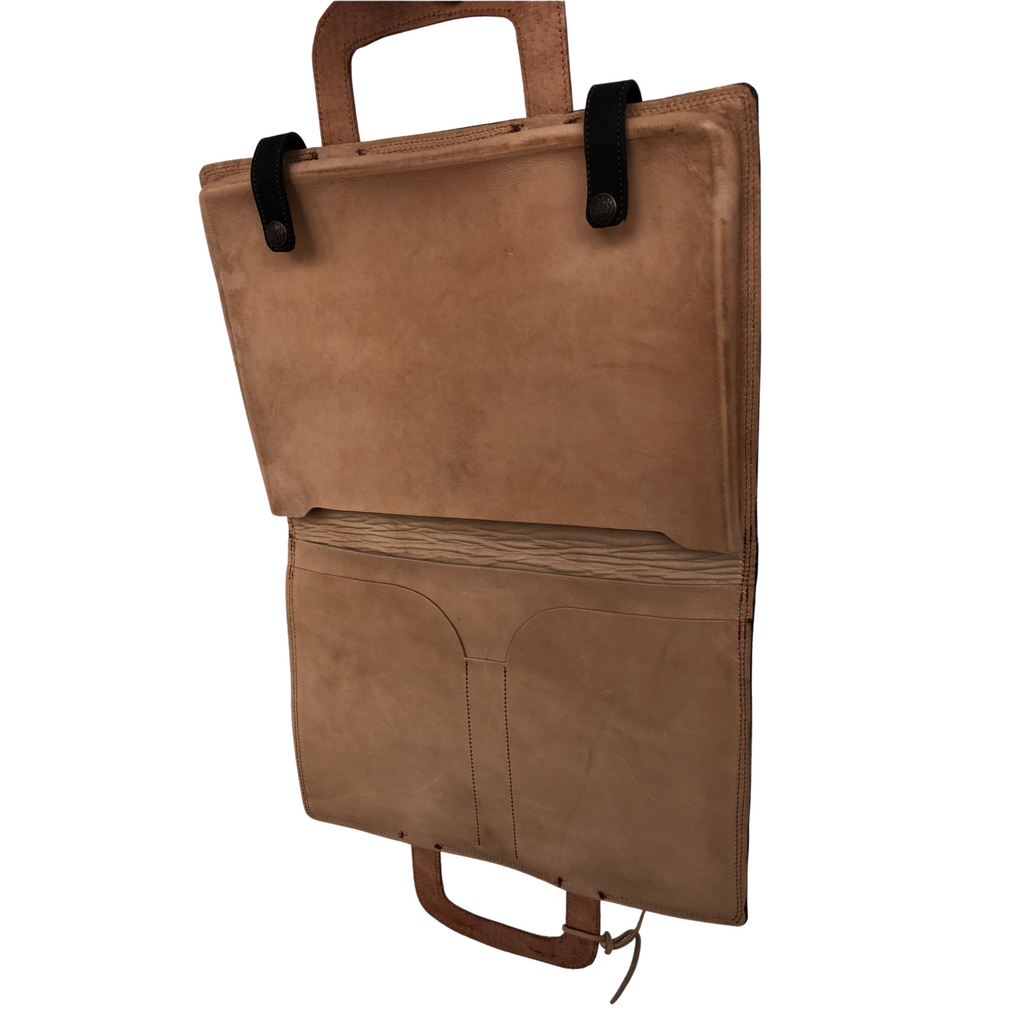 Tan inside of a black and tan laptop sleeve